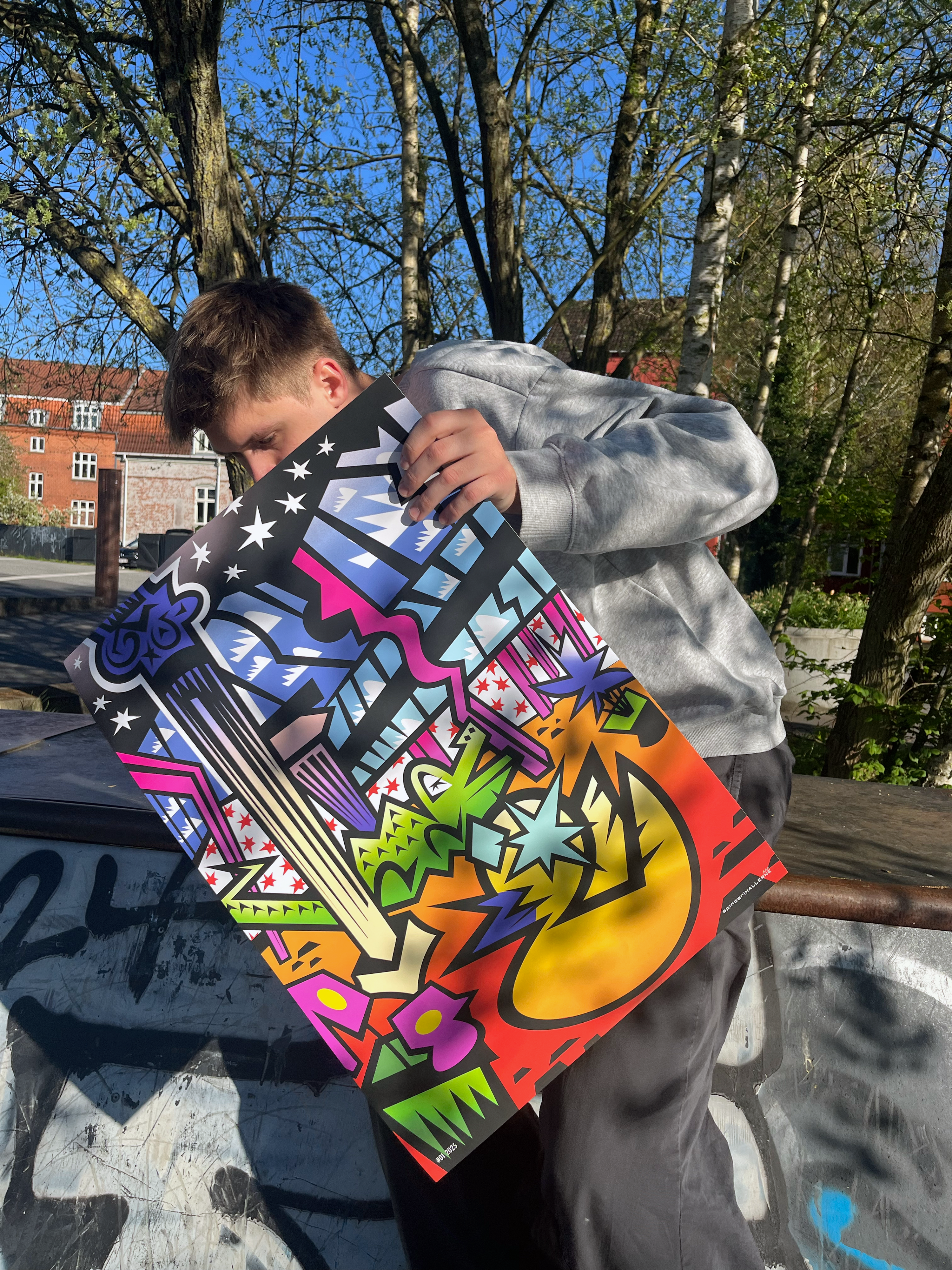 Facio with poster