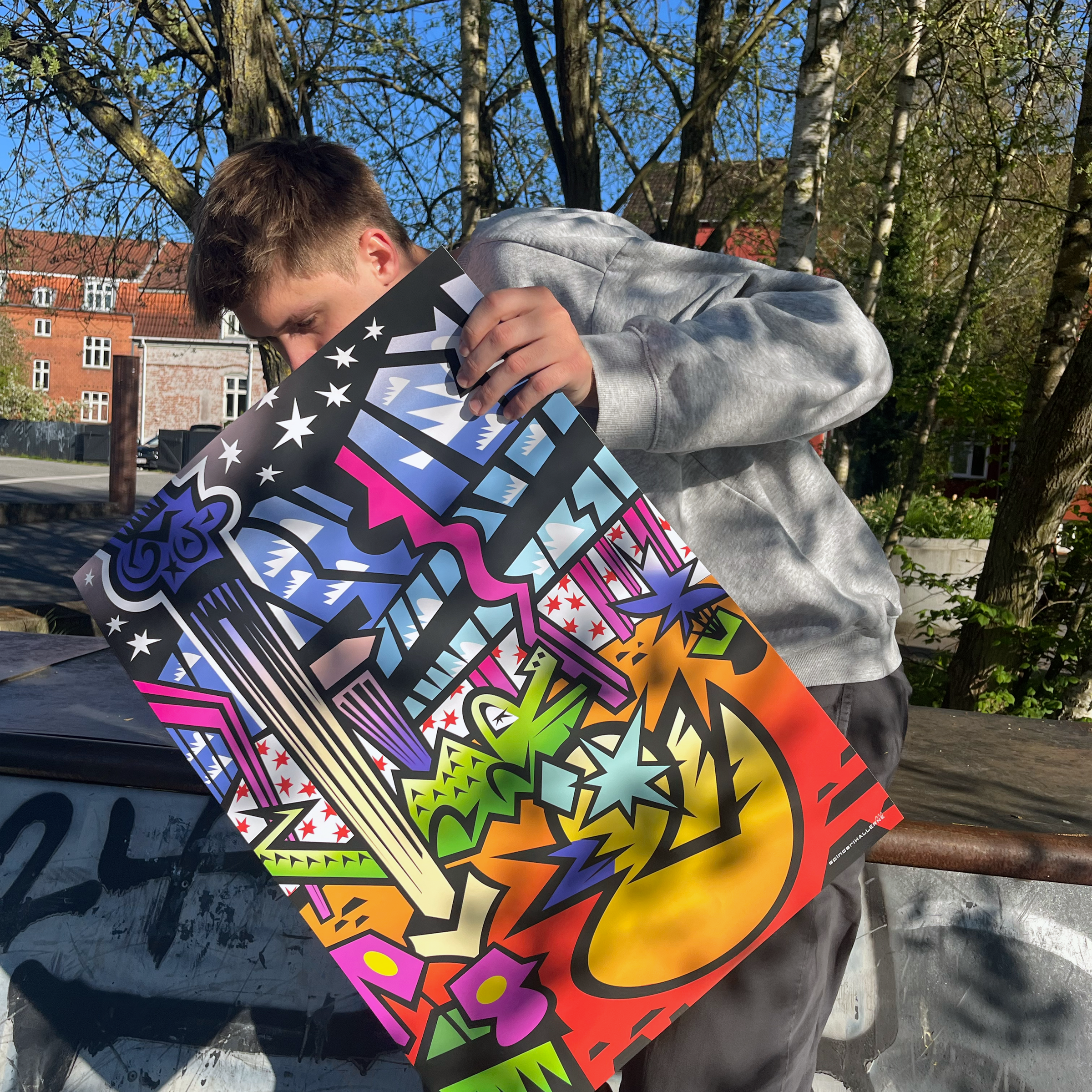 Facio with poster